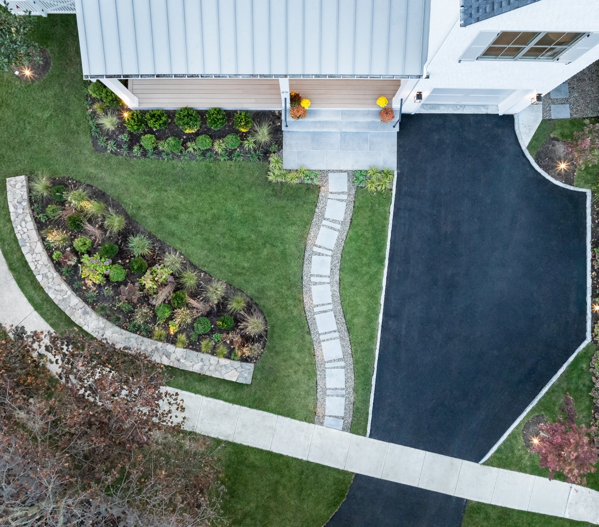 Aerial view of house entrance and driveway